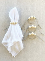 Load image into Gallery viewer, Natural Triple Wood Bead Slider Napkin Rings, set of 4

