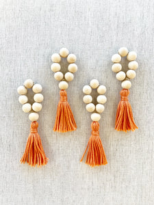 Natural Wood Bead Tassel Napkin Rings, Orange, set of 4